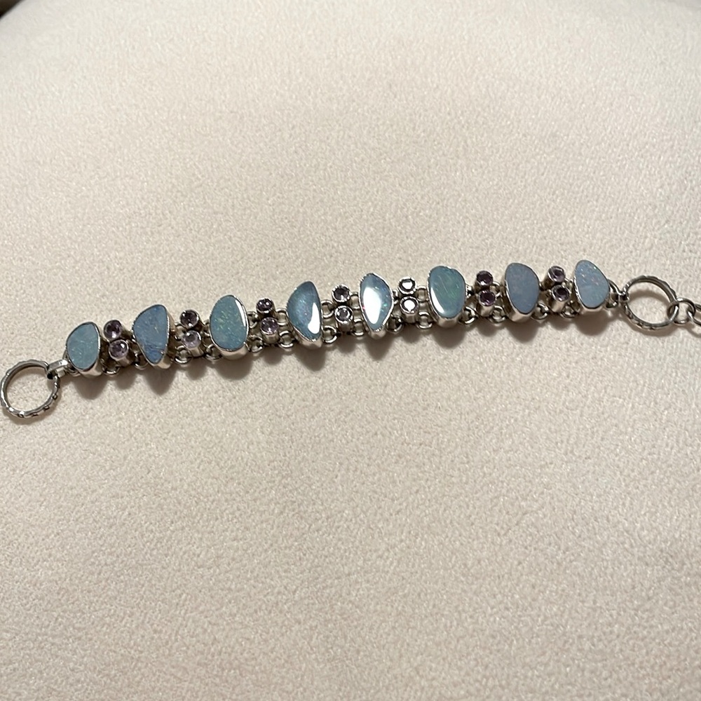 Silver 7 inch bracelet with black opal stones and amethyst.